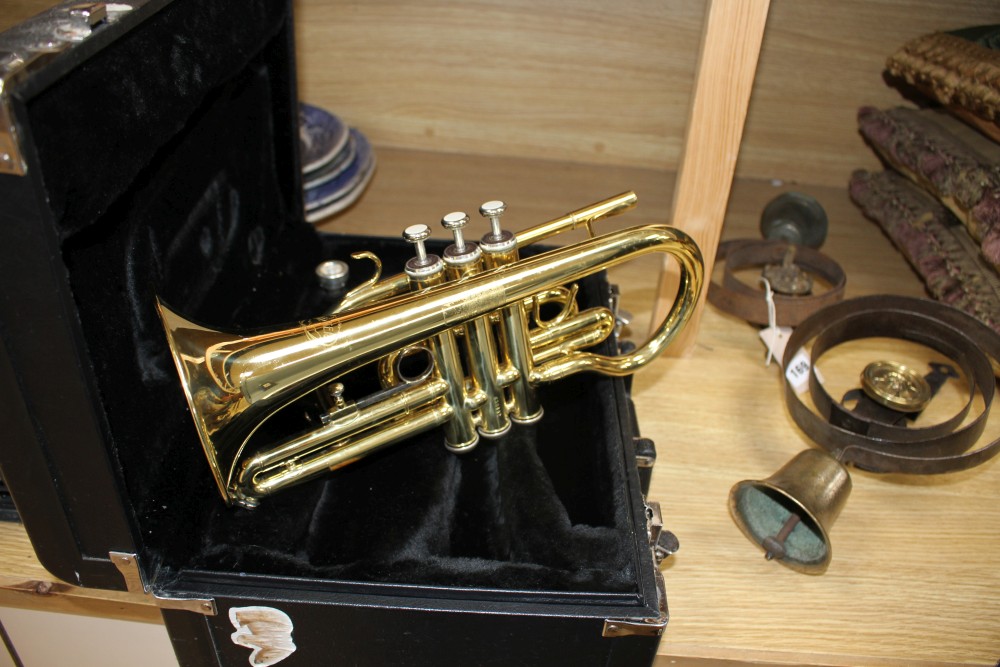 A cased Jupiter brass cornet, numbered JCR-520M, 33cm
